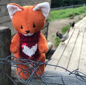 <p>Handmade fox in a hand knit adorable sweater with a chicken image.&nbsp;<br />
<br />
Made according to old European patterns.&nbsp;<br />
<br />
The eyes and nose are embroidered and the&nbsp;toy has movable arms and legs and can easily sit on its own.<br />
<br />
Measures 6in. standing up.&nbsp;<br />
<br />
<br />
Due to small parts, NOT SUITABLE FOR CHILDREN 3 AND UNDER.</p>