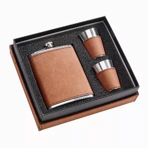 Impress your friends with our caramel colored flask set. The set includes a stainless steel, 8 oz flask wrapped in caramel colored leatherette, 2 stainless steel shot glasses in a matching caramel colored leatherette and an impressive gift box with a cover that is also wrapped in the caramel colored leatherette to provide even more engraving options. This set can be laser engraved and the engraving will show as black. Gift boxed.
