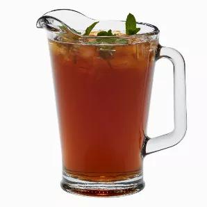 This 9" tall glass beverage pitcher is truly all-purpose. The base is 4.5" that flairs to 5.5" diameter at the top (not including the handle and spout). This is a heavy duty pitcher that you can use in a dining room or a home wet bar or even in commercial applications. We carefully pack 6 of these pitchers in a brown corrugated box.