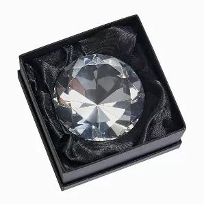 This radiant, faceted clear diamond shaped paperweight will add beauty to any desk, and can be given as a favor for any special occasion. It measures 3.25" in diameter. Packed in black gift box with white satin lining.