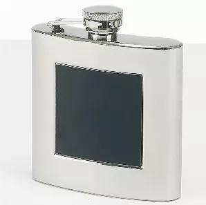 Our Stainless steel flask with a black engraving plate holds 6 oz. The shiny finish adds to the stylish look of this flask for either men or women. When the optional engraving is added to this black plate, the engraving comes out with a silver look. The hinged top ensures that the cap will never go missing. Perfect size for pocket or purse. Non tarnish finish. Gift Boxed.