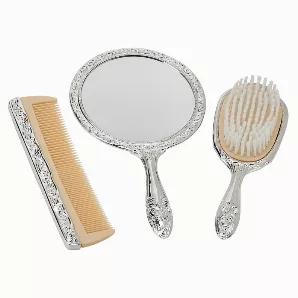 This elegant brush set is embossed with a ornate design. The set is produced in a non-tarnished bright nickel plated finish. The comb is 7.375" L with cream "teeth". The brush measures 7.375" L and the mirror is 5.125" long. White gift box.