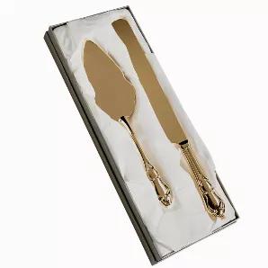 This gold tone plated cake knife and server set is a modern antique. The elegant fluting of the cake server and the detail on both the handle and the server give this set an "old fashioned" look with the advantage of today's craftsmanship. The cake knife is 14.25" long and the cake sever is 11.25" long. Gift boxed.