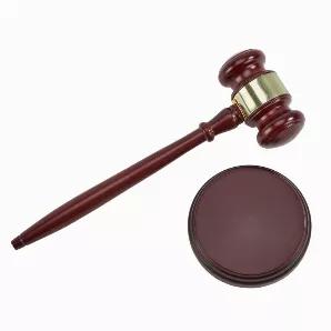 Here's the ideal gift for the chairperson of your organization, board or bank, or the guest auctioneer for your favorite charity or maybe even the judge themselves. This solid wood, walnut finished gavel is 10.5" long. The gavel includes a brass toned metal band that is removable and can be personalized, as can the actual gavel and the 4" round striking block. Call your meeting to order or end it with authority with this great gavel set. The entire set is presented resting in a black foam cutout
