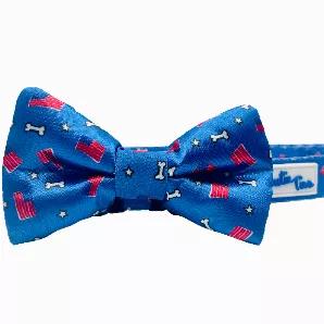 <p>Show pride and celebrate heritage while keeping your best furry-friend in the Red, White and Bones dog bow tie depisting the American flag. Our bow ties are made with high-quality fabric and thickly sewn; contributing to its durability. A portion of all purchases will go to the magic bullet fund. Free shipping on orders over $10 (contiguous United States). Show pride and celebrate heritage while keeping your best furry-friend in the Red, White and Bones dog bow tie depicting the American flag