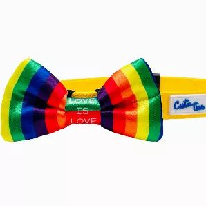 <p>Love is love! Celebrate pride with our new rainbow tie bow tie!</p>
<p>Our bow ties are made with high-quality fabric and thickly sewn; contributing to its durability. All bow ties are 2" x 4" and fastens securely over any dog collar easily with the two elastic loops on the back of the bow tie - as seen in pictures. *Collar not included.</p>