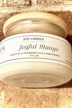 <p>Joyful Mango is the launch and signature scent of Josephine + Joy Candles. Sure to bring a smile to your face, this warm and inviting scent is a fruit medley made up of pineapple, peach, warm sugar, mango and coconut milk. Feel the joy. Spread the joy.</p>
