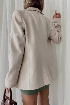 <p>This blazer is a must have for spring season. It goes with every outfit combination. It is a double pocket blazer jacket in stone color. Just as elegant as it looks!</p>