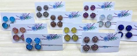 Handmade resin faux druzy earrings with surgical steel posts. These are approximately 8mm without border and 10mm with. You will receive 6 random pairs.