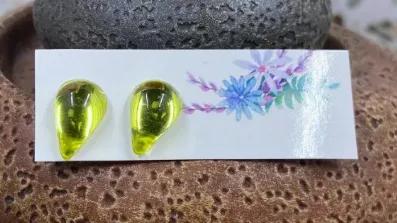 These handmade studs are made with electric yellow glass with mirror background and stainless steel posts. Approximately 13x8mm.