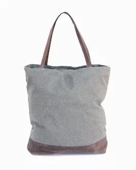 <p>The perfect carry-all for every day!  The Anna Tote is made from a recycled polyester canvas made from discarded plastic water bottles. With an inside zipper pocket and a heavy duty zipper at the top, you can be sure everything will stay in its place. Made with great precision by our talented sewing team in Haiti.</p>
<p>Details: 16" (T) x 14" (W ) x 4" (D)</p>
