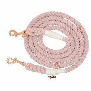 Beautiful colored rope will be sure to add a pop of color to any dog's wardrobe! <br>Made with strong, 100% cotton rope and natural dye. <br>The rope is hand-spliced and ends are whipped to add strength and durability. <br>Finished with beautiful rose gold hardware with a rose gold dog charm and accessory ring.