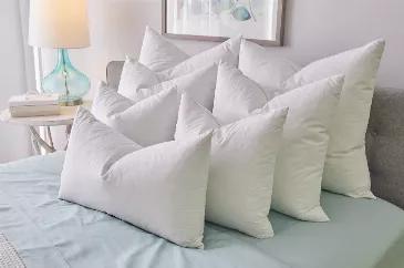 Polyester filled pillows are going to give you a firmer feel and look.  These inserts are great for shams on beds and areas where you would like the pillows to be more supportive.  Size 26x26 insert will work with most covers size 24-28".  This is a perfect product to fill Euro Shams. This comes as a set of 2.