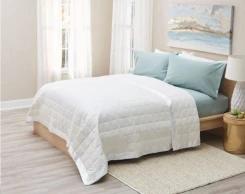 Luxurious down filled blanket adorned with 3" Satin Binding.  Blanket is a downproof 230tc 100% Cambric Cotton and is filled with white down.  A 4" box quilt stitch keeps the down in place.  Perfect light weight blanket to add to any bed in any season!