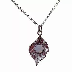 <p>The most stunning example of recycling! Beautifully textured sterling silver leaves are highlighted with a glowing glass gem handmade from broken reclaimed antique bottles and glass! The glass has been reclaimed, ground and fired into a 6mm gem, then mounted on the .925 sterling leaves, textured with detail front and back. Hangs on 18" sterling chain.</p><p>Leaf measure in length approx. 1 1/4" and approx 3/4" in width.</p><p><strong>Each piece includes "The Story of the Glass" detailing the 