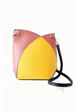 <p>Material: 100% Calfskin</p>
<p>Color: Yellow, Pink</p>

<p>Opening with magnetic closure. Flower bud inspired asymmetric design. Contrasting patchwork with Inner comparment.</p>