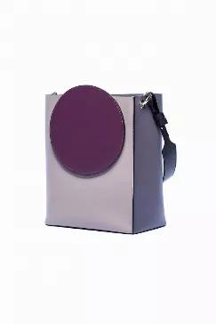 <p>Material: 100% Calfskin</p>
<p>Color: Purple</p>

<p>Tote-style shoulder bag. Circular designing on front. Color contrasting with differ shaped patchwork.</p>