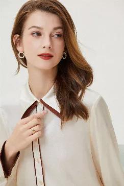 <p>Fabric: 93% Mulberry silk</p>
<p>             7% Spandex</p>
<p>Color: Cream, Brown</p>
<p>Care: Hand wash or dry clean</p>
<p><br></p>
<p>A luxurious, soft, light-weight shirt. Made with silk. This shirt has a turn-down collar. This button down shirt has a straight silhouette and can be worn with jeans. Unlined.</p>