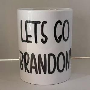 <ul>
<li>Lets Go Brandon!, COFFEE Mug </li>
<li>Holds approx 15 ounces of your favorite liquid </li>
<li>Mug is designed to have a handcrafted look</li>
<li>Measures 4.5" high</li>
<li>Comes with Gift Box</li>
<li>Material-Ceramic</li>
<li>Color-White</li>
</ul>