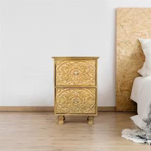 This two-drawer mango wood bedside table is easy to operate and can add luster to your interior decoration. Whether you're using it next to your couch or bed, with the two drawers on top, you can easily access what is inside. Instantly transform any room into a luxurious and eye-pleasing look with the unique engraved carvings on the drawers! Beautify this piece by placing books, photos, or lamps on top -- anything that suits you! This piece from Spitiko Homes is handmade with the highest quality
