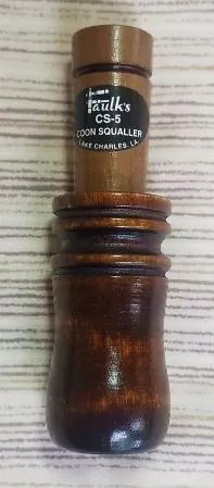 <p>Coon squaller with a walnut finish. This call imitates a fighting coon. Easy to use with instructions.</p>