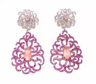<p>Behold the beauty and splendor of this sparkling swirl design from Canari Jewels ! Simulated Ruby and White Diamonds surround and draw the eye in to each Unique Hand Cut Natural Pink agate Gem Stones.The chic surprise of contrasting colors like stunning Pink Agate married with red and white Color make the Chantilly Earring in a class of its own.They're crafted of polished sterling silver and secure to the ears via omega backs<span class="redactor-invisible-space">.</span></p><div><h3>Drop Ear