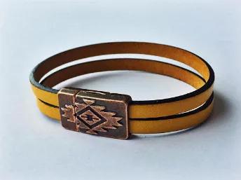 Each bracelet is made with two strands of genuine leather and an antique copper magnetic tribal clasp.

SM/MD SIZE: 6.5"
LARGE SIZE: 7.5"
(Custom sizes welcome)

If you would like gift boxes included in your order, please order those separately! Thank you!