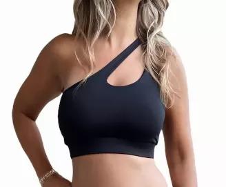 Figure-hugging and supportive with coverage, the All Black Athletic Bra & Swim Top is a one shoulder silhouette that is elevated by a shoulder cut-out. A wide chest band adds extra support during movement. Wear yours with the matching Black Yoga or Macrame Legging.<br>Expertly designed as yoga, gym, and swimwear<br>Light to medium support fits an A through DD cup size<br>Secure fit to hold you in place even during cardio and inversions<br>Quality fabric washes well and won't stretch or pill <br>