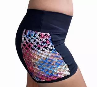 This short has us turning over to the dark side. The Black & Rainbow Macrame Athletic Shorts features a mid-rise contouring waist band and dynamic Macrame side cut-outs that add flare to every move. Where yours with the matching Black & Black Macrame Athletic & Swim Top <br>Created for yoga, cardio, and causal wear <br>Quality compression fabric is flattering and allows you to move freely <br>Hand crafted Macrame detail lays flat on the skin with no bulging effects <br>Quality fabric washes well