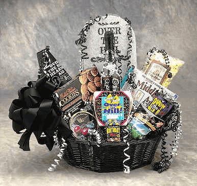 That over-the-hill birthday will be lots of fun when the Over The Hill gift basket arrives. A tombstone towers over cookies, "over the hill" pills, and "over the hill" mug, lots of goodies as well as the Victims Guide to Birthdays book. Don't miss the "over the hill" hearing aid so they can hear you sing Happy Birthday! Send the Over the Hill gift basket to your favorite "senior citizen". The Large Over the Hill Birthday Gift Basket includes: 6"Over the Hill Tombstone, Over the Hill Fortune Cook