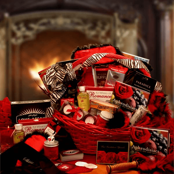 Romance is in the air... along with some seductive secrets in this Naughty Nights Couples Romantic Gift Basket. Only for the daring this exclusive and exciting gift basket is sure to light your night on fire with an array of tempting ways to tantalize and entertain your Valentine this year. Try it, you may like it... Includes: Vanilla musk massage oil, 4 assorted 1 oz. chocolate body paints, Pheromone aromatherapy candle, Sensual pillow and sheet spray with Pheromones, Feather Tickler, Rendezvou