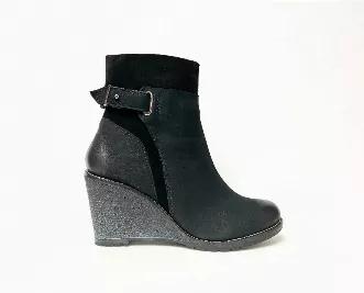 <p>Wrap up in comfort and style wearing this dashing pair of wedge booties designed with dual colors and upper embroidery details. Featuring a stable rubber heel, side zippers, and buckle designs.</p>
<ul>
<li>Suede upper</li>
<li>Zip-up style</li>
<li>Wedge heel</li>
<li>Cushioned footbed </li>
</ul>
<p><strong>Composition:</strong></p>
<ul>
<li>Footbed: 100% Leather</li>
<li>Upper: 100% Leather</li>
<li>Lining: 20% Leather + 80% Textile</li>
</ul>
<p><strong>Measurements:</strong></p>
<ul>
<li