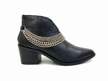 <p>Own a modernized wild west look wearing this pointed-toe ankle boots featuring a front cutout design and silver chains to add a dash of chic vibes.</p>
<ul>
<li>Slip-on</li>
<li>Block Heel</li>
<li>Back zipper design</li>
<li>Cushioned footbed</li>
<li>Metal chain embellishments </li>
</ul>
<p><strong>Composition:</strong></p>
<ul>
<li>Upper: 100% Leather</li>
<li>Lining: 20% Leather + 80% Textile</li>
<li>Insole: 100% Leather</li>
</ul>
<p><strong>Measurements:</strong></p>
<ul>
<li>Heel Hei