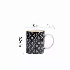 <p data-mce-fragment="1"><span style="font-weight: 400;" data-mce-fragment="1" data-mce-style="font-weight: 400;">A slim band of gold adds understated elegance to dazzling modern geometric mugs. A classic, contemporary collection that's been our favorite for its fine quality, durability and versatility. The gold-rimmed dinnerware has an attracting, modern look with a touch of sophisticated glimmer.</span></p><p data-mce-fragment="1"><span style="font-weight: 400;" data-mce-fragment="1" data-mce-