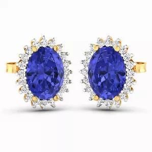 Enjoy a taste of glittering glamour with these stylish Earrings. The Earrings consist of oval tanzanite gemstones and are made of fine finish 14k yellow gold. The stones have a combined weight of 2.56 carats, and are arranged to display their sensational shine to the max! Light up whichever room you are in with these dashing Earrings.
