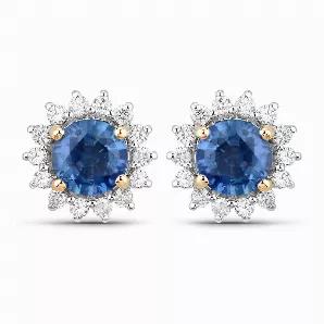 Enjoy straight-up sparkle with these pretty halo Earrings. The round blue sapphire stones are beautifully set in 14k yellow gold with fine finish and have a total weight of 1.58 carats. These Earrings boast an iridescent sparkle that you'll want to wear with everything. Make a big statement with these dazzling blue sapphire Earrings for women!