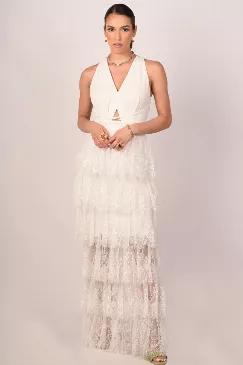 <div style="text-align: left;">An ethereal multi-tier lace maxi dress in white. The fitted bodice of the dress has a v-neck with a triangular cutout on its empire waist, accented with braided straps. From the waist down, six flouncy layers of sheer lace create a floor-length skirt of the dress, adding a touch of royalty. Its pristine white color complements the subtle construction details.  Material:</div><div style="text-align: left;">V-neck</div><div style="text-align: left;">Sleeveless</div><