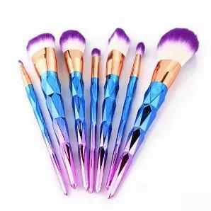 Just the matter of spotting these and you will fall in love with them... We mean to say these exotic looking makeup brushes!<br>Aptly named due to their long colorful handles with the Diamond pattern that looks like the Unicorn horn spiraling down from the silky Purple brush hair applicators, they are truly one of its rare kind... Perfect for your vanity, these unique brushes give you awesome results every time you apply foundation and contour your face...The shiny and soft brushes are so much f