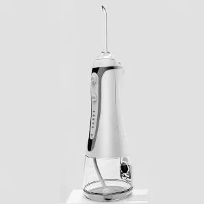 The Portable Water Flosser and picker is an affordable choice for dental care for everyone who cares for fresh breath and youthful smile...<br>
Take good care of your teeth with this Water Flosser and Pik that gives a continuous powered jet stream of water. It cleans and pushes the dirt out of the teeth in nanoseconds with over 60 strokes of water jet per second. Totally cordless and no extra tank required, as it has a built-in tank for continued use. Easy to fill directly from the tap and no ch