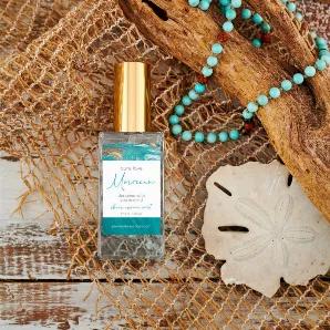 <p>Sunkissed notes of golden amber & oceanic musk elevate your beachy vibe, while glimmers of exotic coconut surrender your aura. Infused with natural essential oils; glass bottle is adorned with genuine amazonite & turquoise gemstones {the soothing stones that enhance love}.</p>
golden amber | oceanic musk | exotic coconut  <br> How to Use: <br>

The sheer essence mist imparts an ethereal veil over your body, clothing & mane. For best aromatic results, layer with the pure essence oil. <br>
Appl