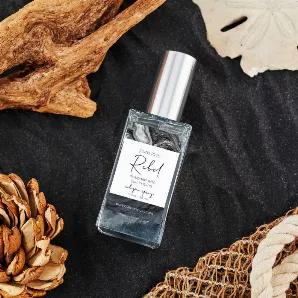 <p>Untamed notes of rugged leather incite fire in your soul, while hints of sensual woods seduce your senses. Infused with natural essential oils; glass bottle is adorned with genuine black tourmaline gemstones {the protection stone}.</p>
rugged leather | sensual woods  <br> How to Use: <br>

The cologne spray imparts a swoon-worthy scent over your body & clothing. For best aromatic results, layer with the cologne oil. <br>

Apply LIBERALLY and as often as desired. <br>

Ingredients: <br>

Alcoh