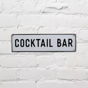 <p>Put a timeless touch on your home bar with our Cocktail Bar Aluminum Sign. Whether you're mixing drinks for yourself or a crew, this signage will set the tone for a cozy night in at your own home cocktail lounge.</p>
<ul>
<li> Aluminum</li>
<li>14" x 4"</li>
<li>Designed in Minnesota</li>
<li> Imported</li>
</ul>
