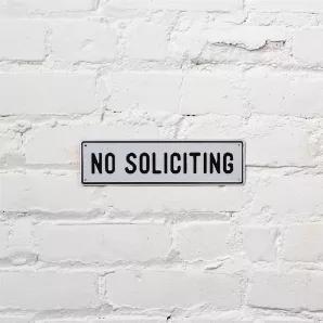 <p>No one likes receiving unwanted solicitation at the front door. Display our No Soliciting Aluminum Sign by your entrance so the message is received before the knock is even at the door. </p>
<ul>
<li> Aluminum</li>
<li>14" x 4"</li>
<li>Designed in Minnesota</li>
<li> Imported</li>
</ul>
