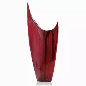 This glamourous red glazed pointed vase is an attractive accent piece that will surely enhance any Decor. It features a crescent shaped opening to add Decorative flowers and a little imagination. This vase is elegant, sleek and contemporary in design. Console tables, book shelves, pedestals or any other place that an accent is needed, are the perfect places for this vase.