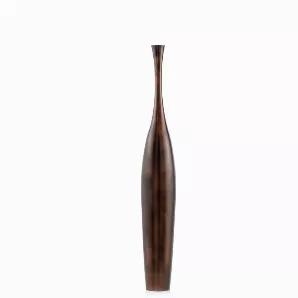 <p>This aluminum cast tall standing Floor Bottle is sleek and contemporary. This being the smaller, these have a beautiful copper antique finish applied. If you are looking for floor accents with height and beauty then look no further.</p>