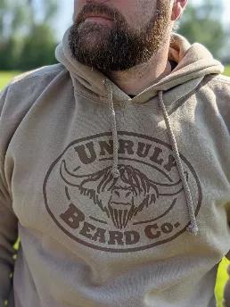 <p>When only comfort will do...</p>
<p>Whether you're exploring the great outdoors, travelling, or cosying up to watch a movie on a cold winters night, look no further. </p>
<p>Feel as snug as a bug in a rug in our NEW Unruly Beard Hoodies! </p>
<p>Available in: </p>
<ul>
<li>Camel Tan or Navy colour.</li>
<li>Medium, Large, or Extra Large sizing. </li>
</ul>
<p> </p>
<p>Our hoodies are a versatile addition to any wardrobe and pair perfectly with jeans, khakis or shorts.</p>
<p class="p1">Pssst!