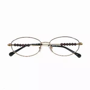 <p>Stunning RX Quality Lightweight Armor Plated Stainless Steel Reading Glasses from Bravo.</p>
<p>:6 Microns of 18 Karat Gold Plating.</p>
<p>: Virtually Indestructible.  Nearly impossible to break.</p>
<p>Scratch Resistant Acrylate Lens for Better Light Transparency for Readers and Longer Lens Life.</p>
<p>: This design accentuated with Redwood Beads from Tibet.</p>
<p>Size: 53-22/145</p>
<p>Personalise to your reading specifications: 1.00; 1.50; 1.75; 2.00; 2.50; 3.00; Blue light blockers</p>