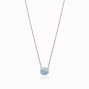 <p>Discreet and colourful this sky blue Monte Carlo pendant is the right balance of chic and playful. You could wear it on a yacht in Monte Carlo with a bathing suit to match or on an evening stroll with a loved one. Adjustable chain included 16"-18"-20".</p>
<ul>
<li>Sky blue enamel</li>
<li>Genuine blue topaz</li>
<li>Rose gold plated silver</li>
</ul>
