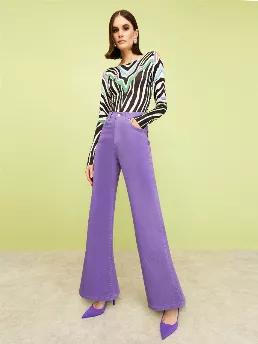 <p>High-waisted five pocket jeans. Front zipper and button closure.</p>
<p>Urban Aboriginals: A unique meld of black, white and purple juxtaposed with striking zebra stripes finds its way to elegant textures in classic suits and dresses. Time for a vision quest for urban aboriginals.</p>
<p>98% Cotton 2% Elastane</p>
<p>Hand Wash Cold; Do Not Tumble Dry; Iron Low; Do Not Dry Clean</p>
<p>Do Not Bleach. Delicate Garment; Handle With Care. Wash Inside Out. Wash Separately and Dry Flat. Do Not Spot