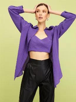 <p>Comfy button shirt with long sleeves and cuffs. Wide strap cropped top with elastic waistband at back.</p>
<p>Urban Aboriginals: A unique meld of black, white and purple juxtaposed with striking zebra stripes finds its way to elegant textures in classic suits and dresses. Time for a vision quest for urban aboriginals.</p>
<p>73% Lenzing Ecovero 27% Polyamide</p>
<p>Hand Wash Cold; Do Not Tumble Dry; Iron Low; Dry Clean</p>
<p>Do Not Bleach. Delicate Garment; Handle With Care.</p>
<p><span>HEI